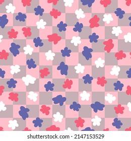 Checkers seamless pattern with colorful flowers in 1970s style. Floral background for T-shirt, poster, card and print. Doodle vector illustration for decor and design.
