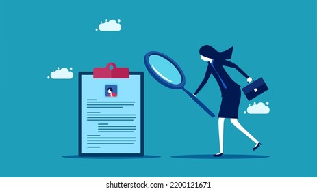 Checking employment history. businesswoman with a magnifying glass examines the applicant documents