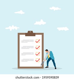 Checklist for work completion, review plan, business strategy or to do list for responsibility and achievement concept. Confident businessman holding pen after completed all tasks checklist.