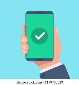 Checkmark on smartphone screen. Green confirmation notification of success finish app update or purchase payment tick on mobile phone holding in hand. Check mark sign vector flat illustration