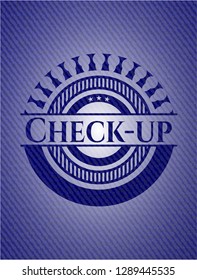 Check-up badge with denim background