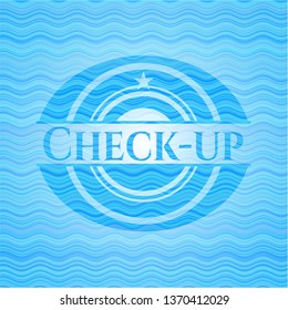 Check-up light blue water emblem.