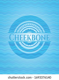 Cheekbone light blue water wave badge background. Vector Illustration. Detailed.