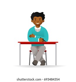 Cheeky african man in sweater and shirt posing. Sitting at table.