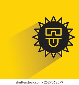 cheeky sun emoji with shadow on yellow background