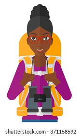 Cheerful backpacker with binoculars.