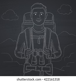 Cheerful backpacker with binoculars.