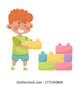 Cheerful Boy Carrying Blocks to Build a Tower Vector Illustration