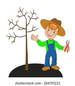 Cheerful boy gardener pruning a tree in spring