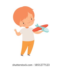 Cheerful Boy Showing Handcrafted Paper Plane Vector Illustration