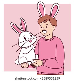 A cheerful boy wearing bunny ears holds a small white rabbit with a joyful smile, symbolizing Easter fun and love for animals.