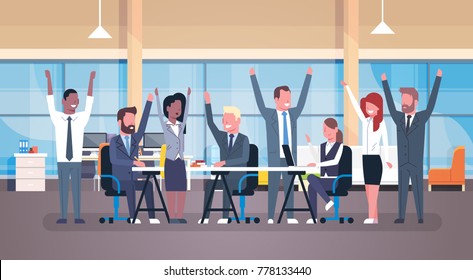 Cheerful Business Team Sitting Together At Desk Happy Group Of Successful Businesspeople With Raised Hands In Modern Office Flat Vector Illustration