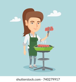 Cheerful caucasian woman cooking steak on the barbecue outdoors. Young smiling woman holding kitchen tongs with a steak while standing near the barbecue. Vector cartoon illustration. Square layout.