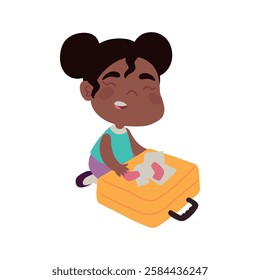 Cheerful child holding luggage and ready to go on a trip