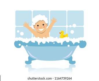 
cheerful child sitting in bathroom with foam and yellow duck