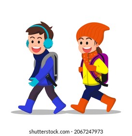 Cheerful children walk together to school in winter