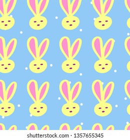 Cheerful children's pattern. Yellow rabbits and white dots on a blue background. For children's pajamas.
