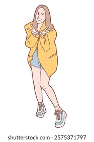 A Cheerful girl in yellow blazer and shorts, posing playfully