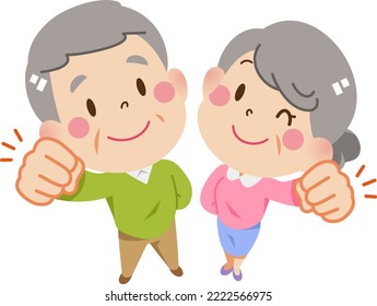 Cheerful grandpa and grandma who took a pose to raise their fists