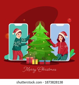 Cheerful Kids Talking To Each Other On Video Call With Decorative Xmas Tree And Gift Boxes For Merry Christmas Celebration.