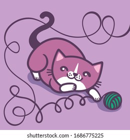 A cheerful kitten plays with a ball of thread.