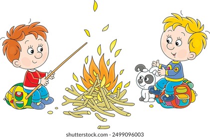 Cheerful little boys tourists with a merry pup resting in their camp and talking by a campfire, vector cartoon illustration