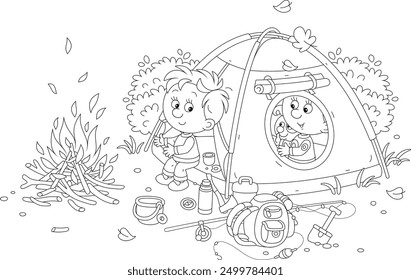 Cheerful little kids tourists with a merry pup resting in their camp tent by a campfire, black and white outline vector cartoon illustration for a coloring book page