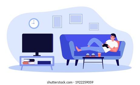 Cheerful man lying on sofa and playing video game. Fun, home, console flat vector illustration. Entertainment and weekend concept for banner, website design or landing web page