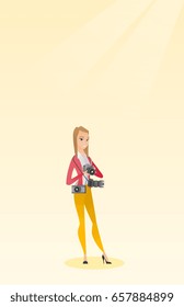 Cheerful paparazzi with many cameras. Young caucasian female photographer with many photo cameras equipment. Professional journalist with many cameras. Vector flat design illustration. Vertical layout