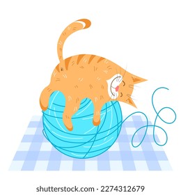 Cheerful red cat relaxes on a blue ball of yarn on a white background with a checkered rug