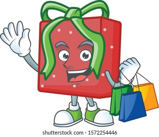 Cheerful red gift box cartoon character waving and holding Shopping bags