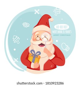 Cheerful Santa Claus Holding Gift Box with Magnifying Glass on Blue and White Background for Merry Christmas Festival.