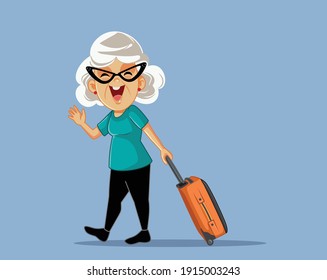 Cheerful Senior Woman Saluting and Traveling with Suitcase. Elderly lady leaving in leisure trip after retirement
