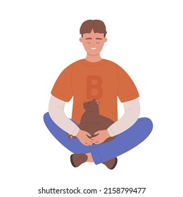 Cheerful sitting boy with crossed legs and cat. Embracing and loving family animal pet cartoon vector illustration
