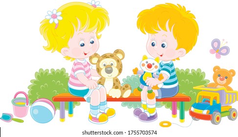 Cheerful small children sitting on a bench, talking and playing with their funny colorful toys on a summer playground in a park, vector cartoon illustration on a white background