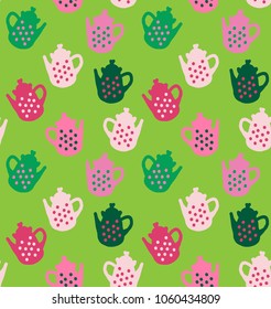 Cheerful teapots in polka dots on green background.