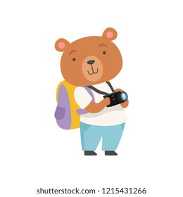 Cheerful tourist bear taking pictures with camera, cute animal cartoon character travelling on summer vacation vector Illustration on a white background