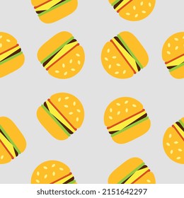 Patrón vectorial alegre con hamburguesas en un fondo gris.