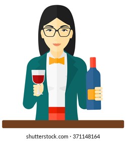 Cheerful woman with bottle and glass.