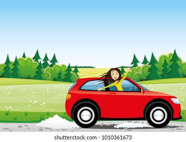 Cheerful woman in a red car on a road in the field.