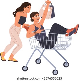 Cheerful woman is sitting in a shopping cart raising her arms and holding shopping bags, while her friend runs pushing the cart, expressing joy and excitement after successful shopping