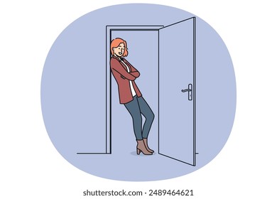 Cheerful woman stands in doorway with arms crossed and saying goodbye to guests. Girl is in doorway and looks at screen with smile, for concept of hospitality and friendship between neighbors