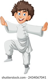 Cheerful young boy in a martial arts stance