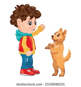 Cheerful young boy teaching his cute puppy to raise its paw, enjoying a playful moment of training and bonding