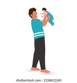 Cheerful Young Man Holding His Baby In Standing Pose.