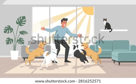 Cheerful young man playing with his four excited dogs inside a modern cozy living room with a cat watching from a shelf.
