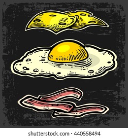 Cheese, fried egg and slices of crisp bacon. Isolated on dark background. Vector vintage engraving illustration for poster, menu, web, banner, info graphic