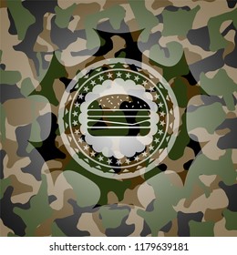 cheeseburger icon inside camouflage emblem