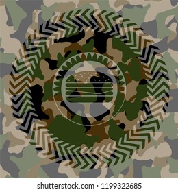 cheeseburger icon inside camouflaged emblem