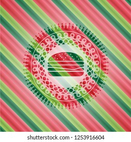 cheeseburger icon inside christmas colors style badge.